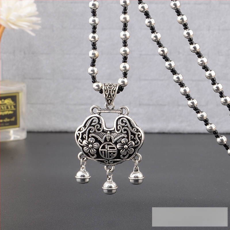 Lydinio puloverio grandinėlė, ilga karolė su kutiniu pakabuku, retro etno stilius