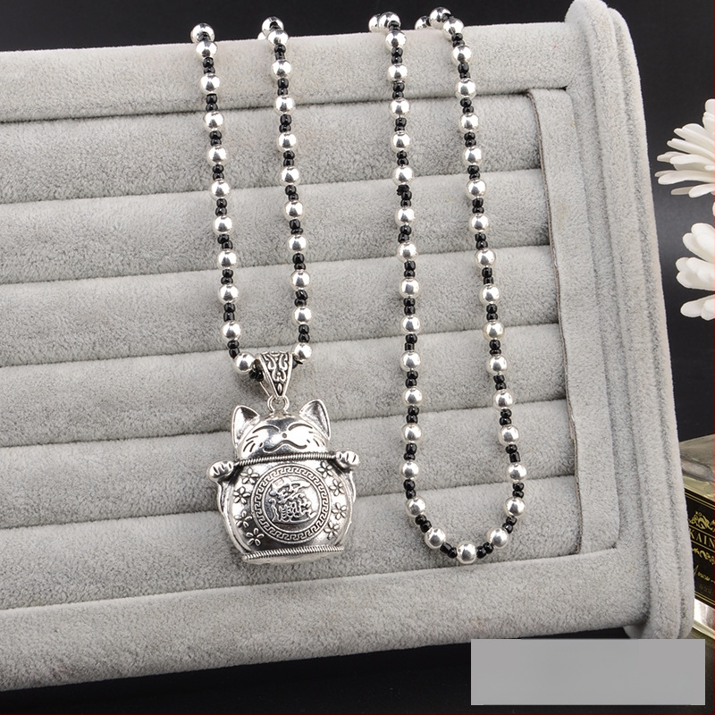 Lydinio puloverio grandinėlė, ilga karolė su kutiniu pakabuku, retro etno stilius