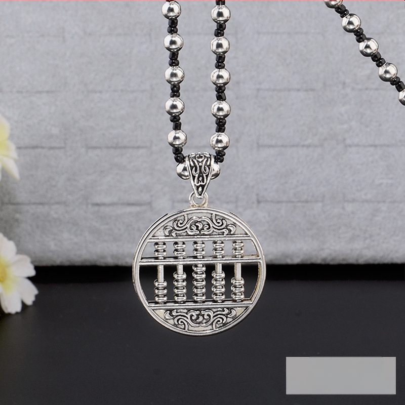 Lydinio puloverio grandinėlė, ilga karolė su kutiniu pakabuku, retro etno stilius