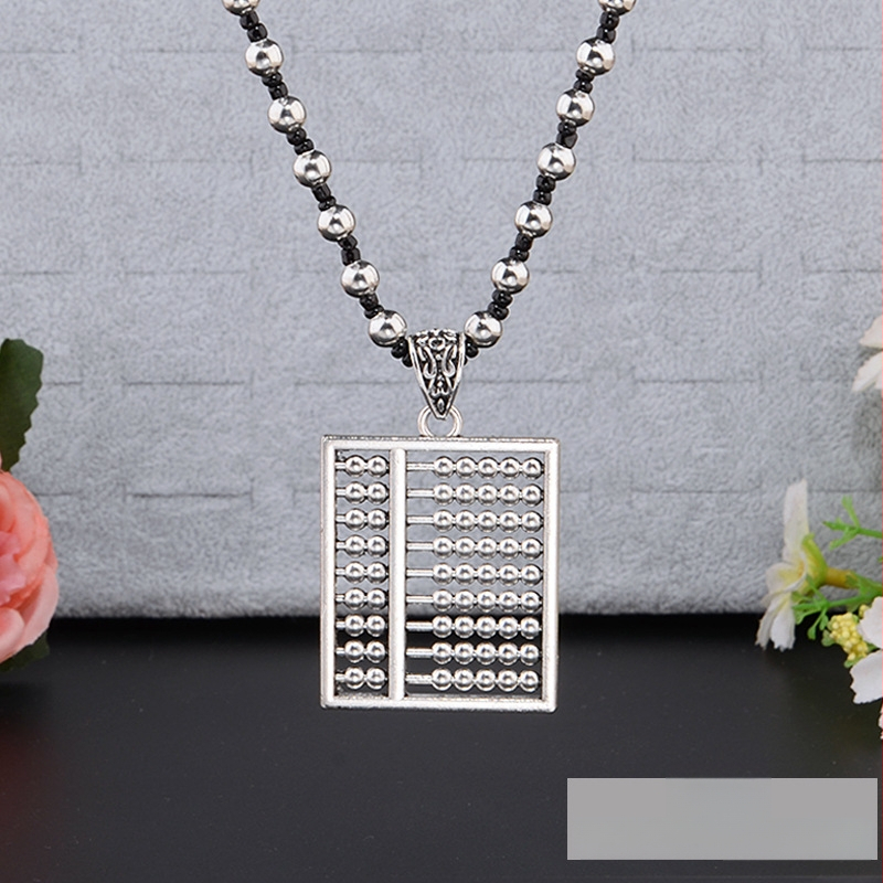 Lydinio puloverio grandinėlė, ilga karolė su kutiniu pakabuku, retro etno stilius