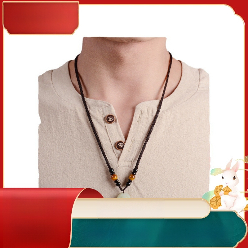 Hetianos nefrito pakabukas ant rankų pintos vėrinio, apdorotas nefritas