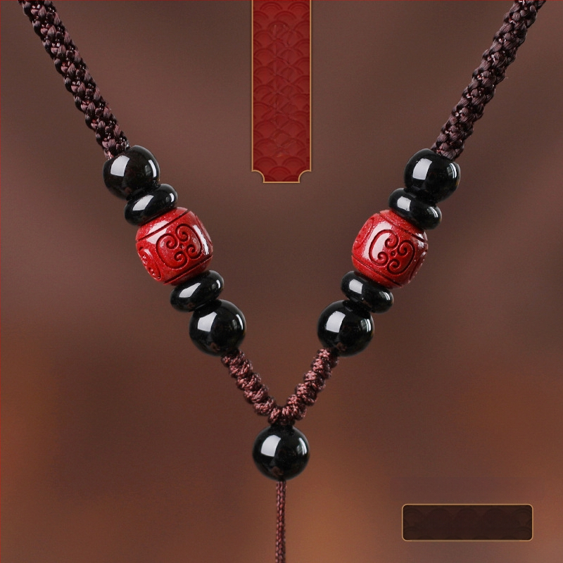 Hetianos nefrito pakabukas ant rankų pintos vėrinio, apdorotas nefritas