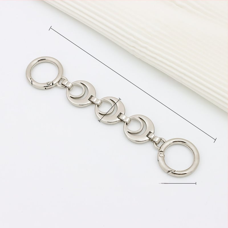 Koti õlarihm pikendatava ahelaga – metall, laiendus, tähtedega muster, kevad 2024