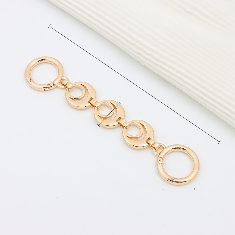 Koti õlarihm pikendatava ahelaga – metall, laiendus, tähtedega muster, kevad 2024