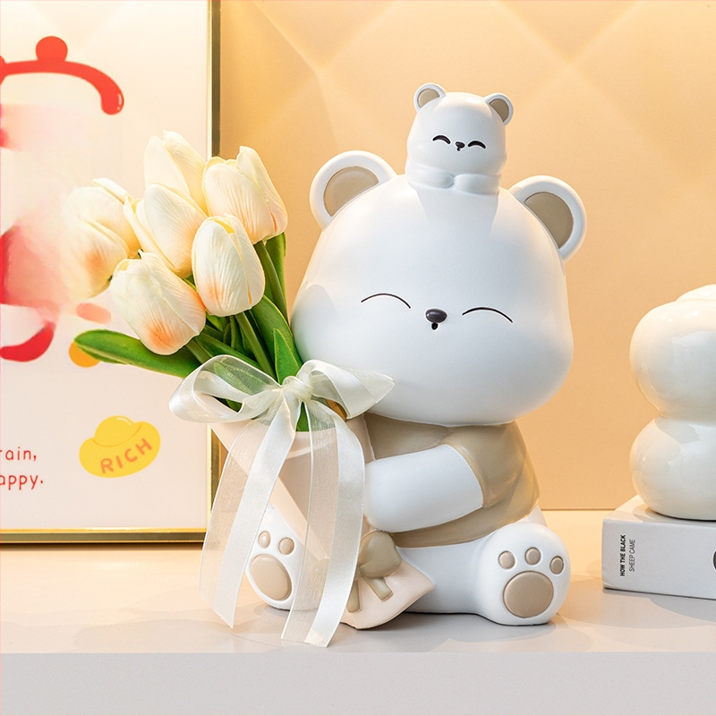Διακοσμητική φιγούρα από ρητίνη: αρκουδάκι που αγκαλιάζει λουλούδια, κατάλληλη για ράφι τηλεόρασης και γραφείο — μοντέρνο μινιμαλιστικό στιλ; ιδανικό δώρο