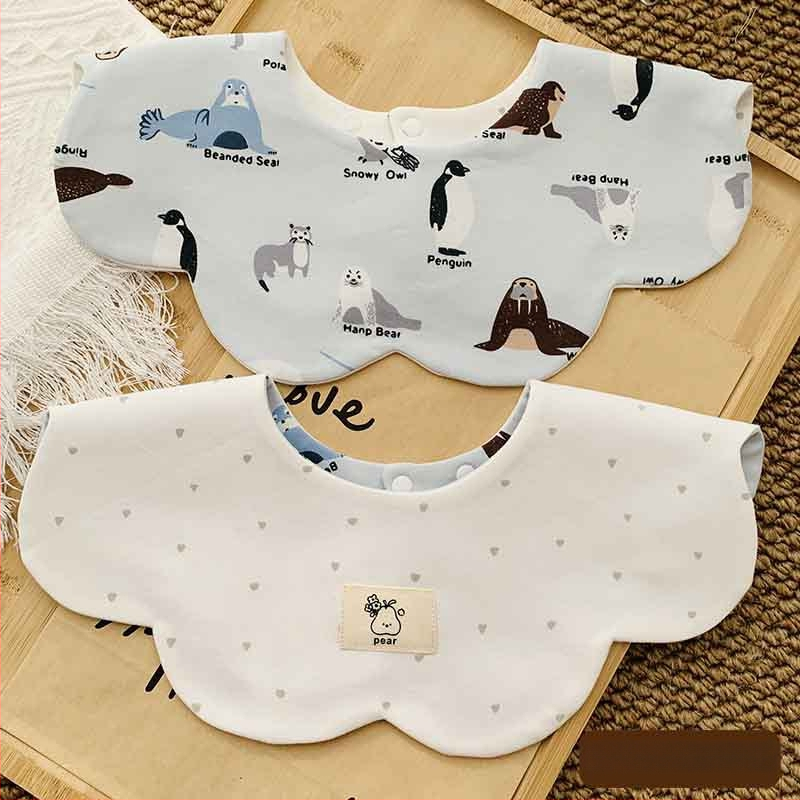 Medvilninė seilinė kūdikiams ir mažiems vaikams (1–3 metų) – dvipusis gėlių raštas, sugerianti