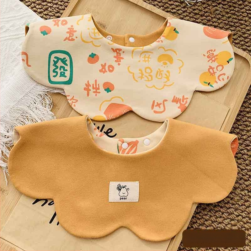 Medvilninė seilinė kūdikiams ir mažiems vaikams (1–3 metų) – dvipusis gėlių raštas, sugerianti