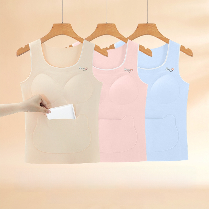 Tüdrukutele talvine termiline vest bez õmblusteta kõhu kaitsega; koostis: 91% polüester, 4,5% elastaan, 2,5% viskoos, 1% villa, 1% moorusilk; 8+ aasta vanustele lastele ja teismelistele (pikkus üle 140 cm)