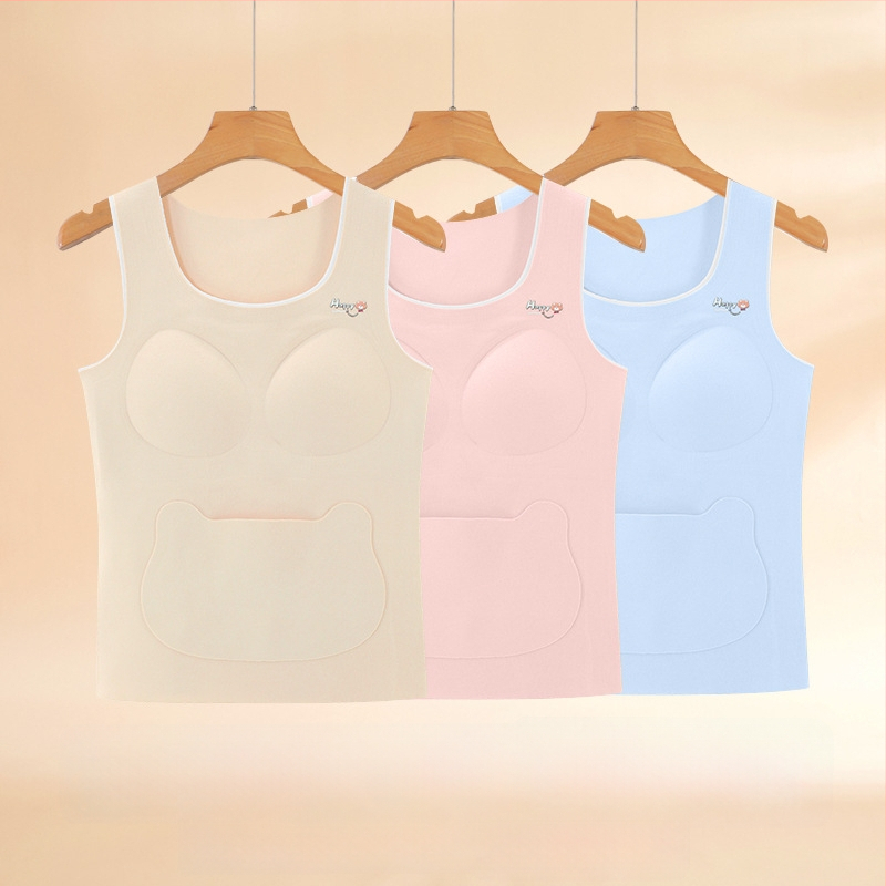 Tüdrukutele talvine termiline vest bez õmblusteta kõhu kaitsega; koostis: 91% polüester, 4,5% elastaan, 2,5% viskoos, 1% villa, 1% moorusilk; 8+ aasta vanustele lastele ja teismelistele (pikkus üle 140 cm)