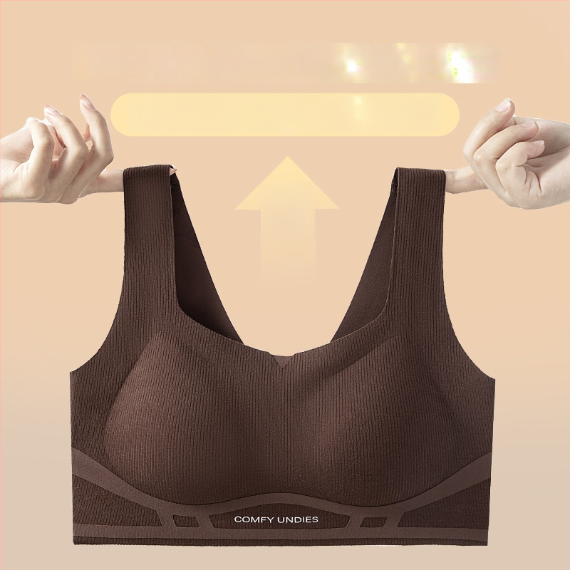 Be siūlių liemenėlė vestės stiliaus su 3D minkšta parama, šoninis suspaudimas ir kvadratinė iškirptė; trikampiai kaušeliai, vidutinio dydžio kaušelis, poliesterio audinys, padas nailonas