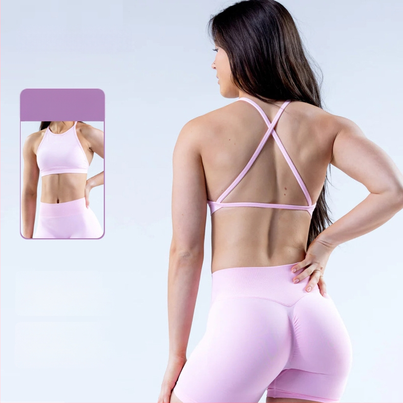 Sieviešu haltera kakla sporta krūšturis ar noņemamām krūšu spilventiņiem, šaurs siluets, sastāvs 90% neilons / 10% elastāns, īss garums līdz vēderam