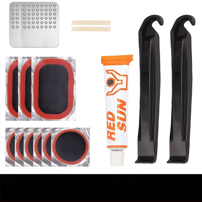 Kalnu velosipēdu riepu remonta komplekts bez līmes — plāksteri un instrumenti plastmasas kastē