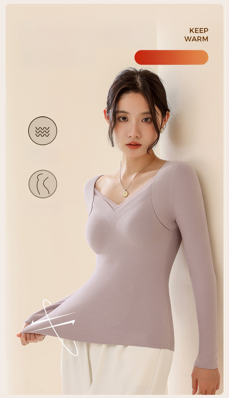 Moteriškas vilnos-silkės šiluminis viršus su V kaklu, įsiūtos krūties kaušės, tankus mezginys 251–300 g/m², pagrindinis audinys 80–90%, ilgos rankovės, kūno formavimas