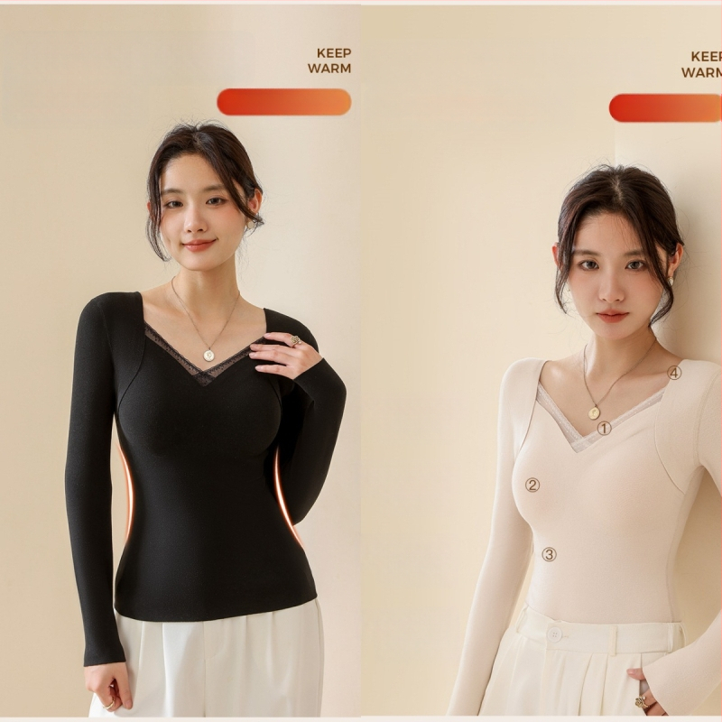 Moteriškas vilnos-silkės šiluminis viršus su V kaklu, įsiūtos krūties kaušės, tankus mezginys 251–300 g/m², pagrindinis audinys 80–90%, ilgos rankovės, kūno formavimas