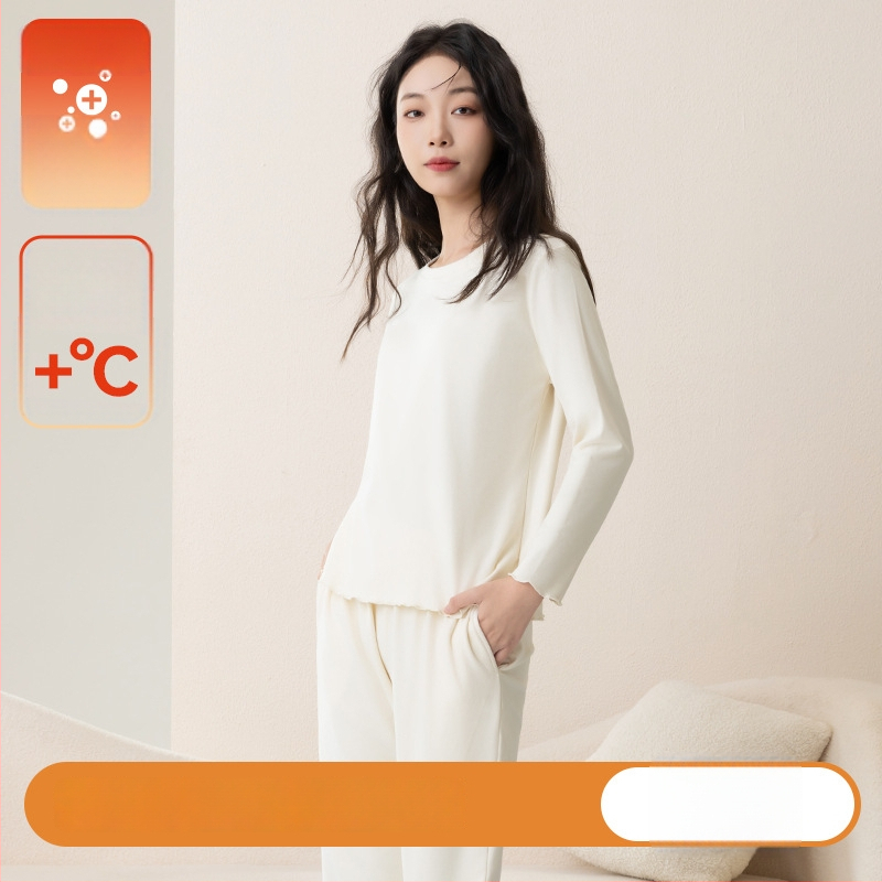 Sieviešu pidžāmas komplekts rudens–ziemas sezonai ar fleece oderi, bieza auduma, apaļš kakls, garas piedurknes; var valkāt ārpus mājas.