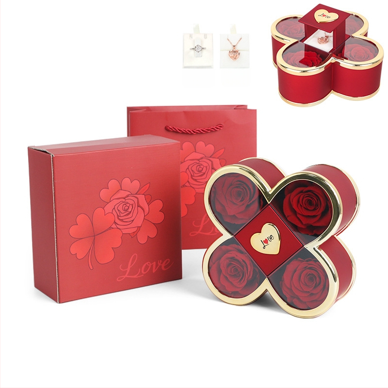 Kaklarotas dāvanu kastīte ar slēgtu četru lapu rozes mehānismu, plastmasas korpuss, kartona iepakojums, iekļauj dāvanu kastīti ar ziediem un somu