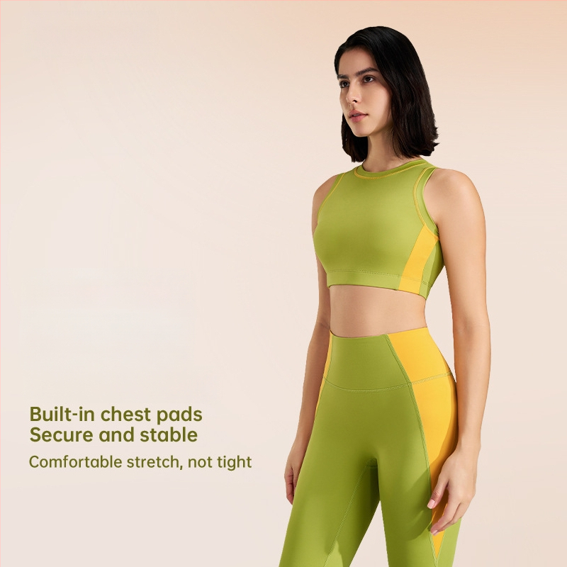 Välistingimustes spordikomplekt: kiiresti kuivatuv ülaosa ilma varrukateta ümmarguse kaelusega ja sisemine tank, devyni punkti pikkusega püksid, Lycra/Nailon kangas (75% Nylon), naistele