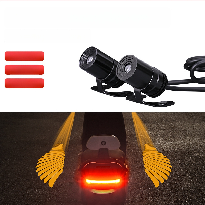 Mootorratta LED-projektsioonivalgusti ingli tiibadega – universaalne, 12–24V, 3W, paigaldus eesisesse siseruum