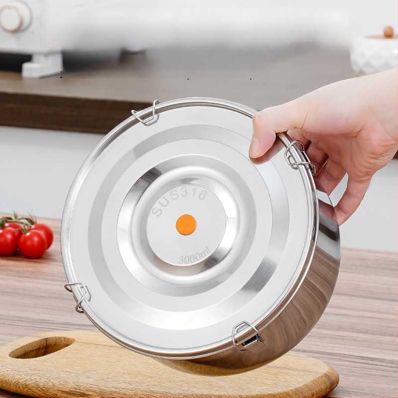 Кръгла кутия за обяд от 304 неръждаема стомана с уплътнение срещу протичане, микровълнова безопасна, капацитет 1–2 л; подходяща за столова и пикник на открито.