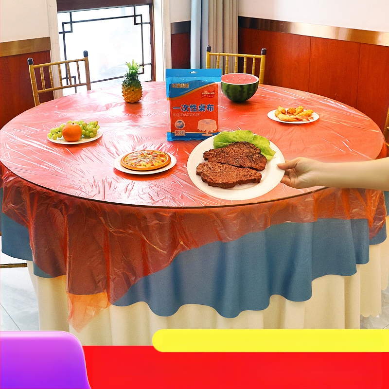 Jednokratni prozirni crveni plastični stolnjak, debeli, jednostruki, vodootporan, za hotelsku i kućnu upotrebu.