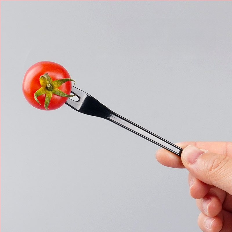 Furculiță de fructe de unică folosință, cu două dinți, stil occidental, din plastic, prietenoasă cu copiii, design modern minimalist.