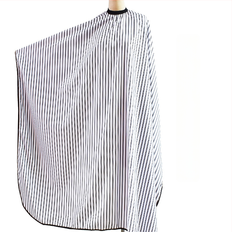 Kirpimo apsiaustas suaugusiems, anti-statinis, neprilimpančias, su reguliuojama kaklo juostele, tinkamas naudoti salone ar namuose.