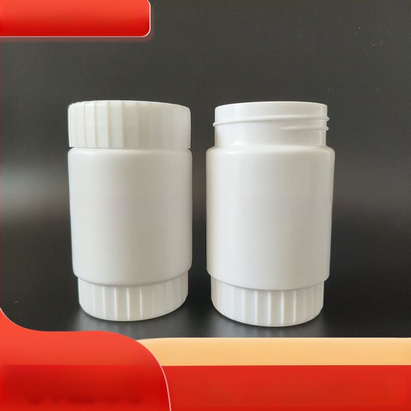 Plastikinė plačiai atidaryta buteliukui žemės ūkio chemijos pakuotei; skersmuo 34 mm; sienos storis 1 mm; apsaugos dangtelis nuo vagystės.