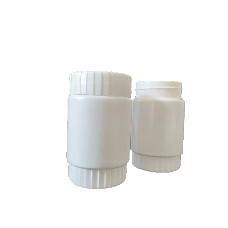 Plastikinė plačiai atidaryta buteliukui žemės ūkio chemijos pakuotei; skersmuo 34 mm; sienos storis 1 mm; apsaugos dangtelis nuo vagystės.