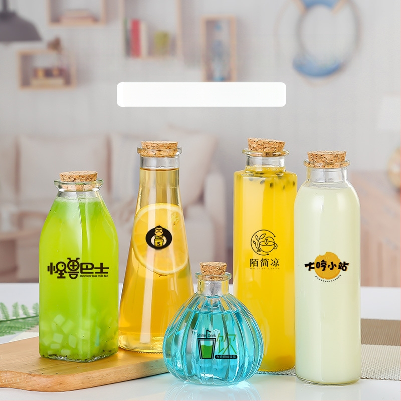 Γυάλινο μπουκάλι τσαγιού με φελλό, στρογγύλος σχεδιασμός, γυαλί υψηλής λευκότητας; προσαρμοσμένο λογότυπο; ματ φινίρισμα.