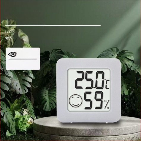 Вътрешен мини термометър KIMTOKA с усмихнато лице, измерва температура и влажност, работи с CR2032 батерия, точност: температура ±1°C, влажност ±5%