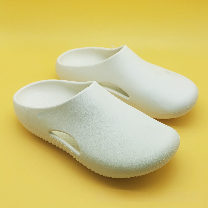 Uniszex EVA szandálok teljes ujjvédővel, egyrészes pántos kialakítás, EVA felső rész és talp, kerek orr, 2 cm lapos sarok, légáteresztő és könnyű sportos papucs