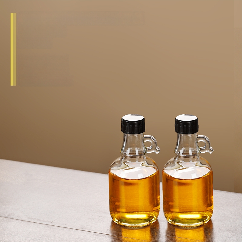 Стъклена бутилка за масло със запечатващ капак, хранителен клас, за сусамово масло и чайно масло, автоматично отваряне и затваряне