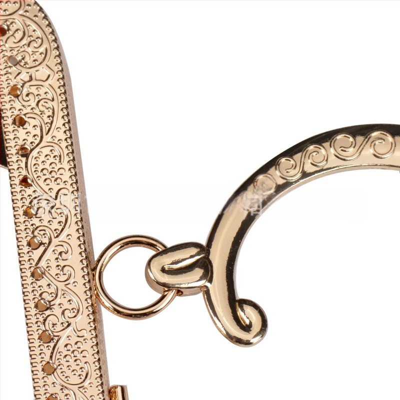 Príslušenstvo k taškám - štvorcový reliéfny S vzor horný rám - železo, bronzová úprava