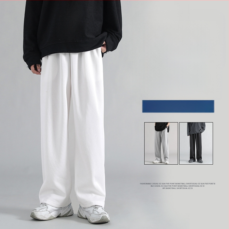 Férfi sportos nadrág lazán szabott, egyenes szárú, középmagasságú derékkal; mikroelasztikusság, poliészter 96–100%