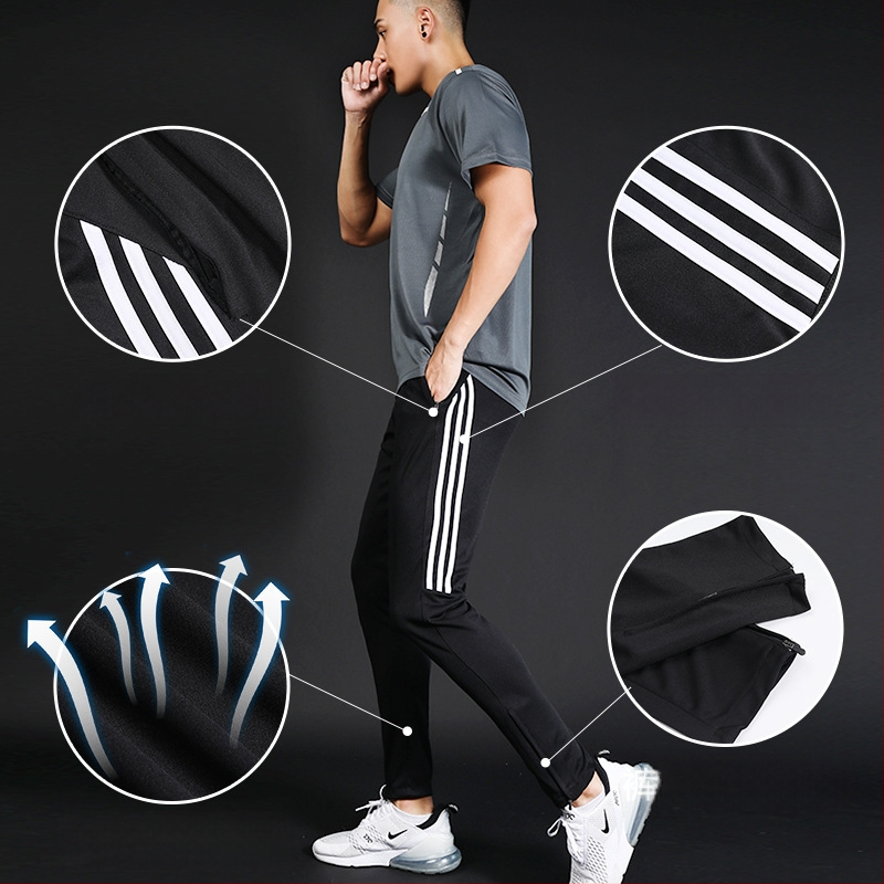 Ανδρικά αθλητικά παντελόνια με μέση στη μέση, εφαρμοστό κόψιμο, ύφασμα γρήγορο στέγνωμα και απομάκρυνση ιδρώτα, πλευρική ρίγα, μίξη πολυεστέρα 98% για τρέξιμο και προπόνηση.