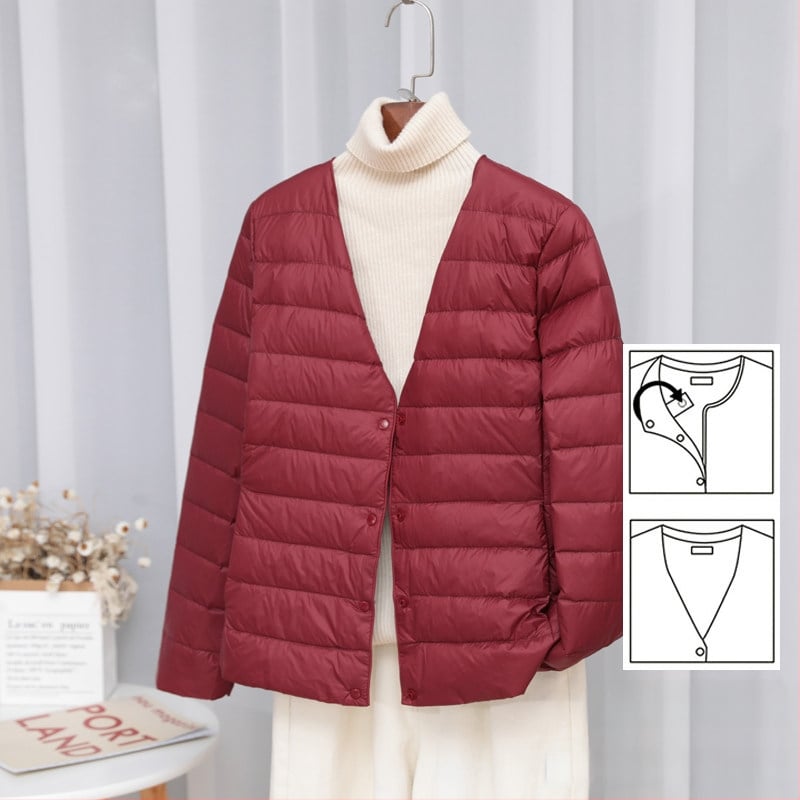 Dámska péřová bunda, štíhla línia, materiál: nylon, výplň: biele kačacie perie, obsah peria 50%, golier typu wood-ear edge