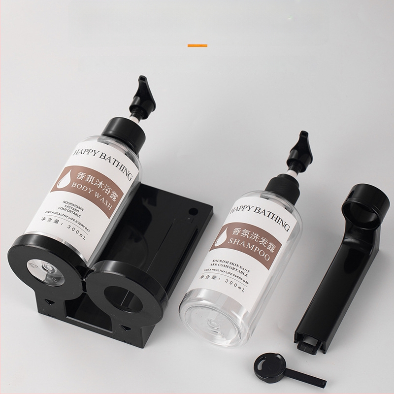 Τοίχο-μονταρισμένος διανομέας σαπουνιού χωρίς διάτρηση – χειροκίνητη πίεση, πλαστικό σώμα. Για μπάνιο ξενοδοχείου. Διανέμει σαπούνι, αντισηπτικό, σαμπουάν και gel μπάνιου.