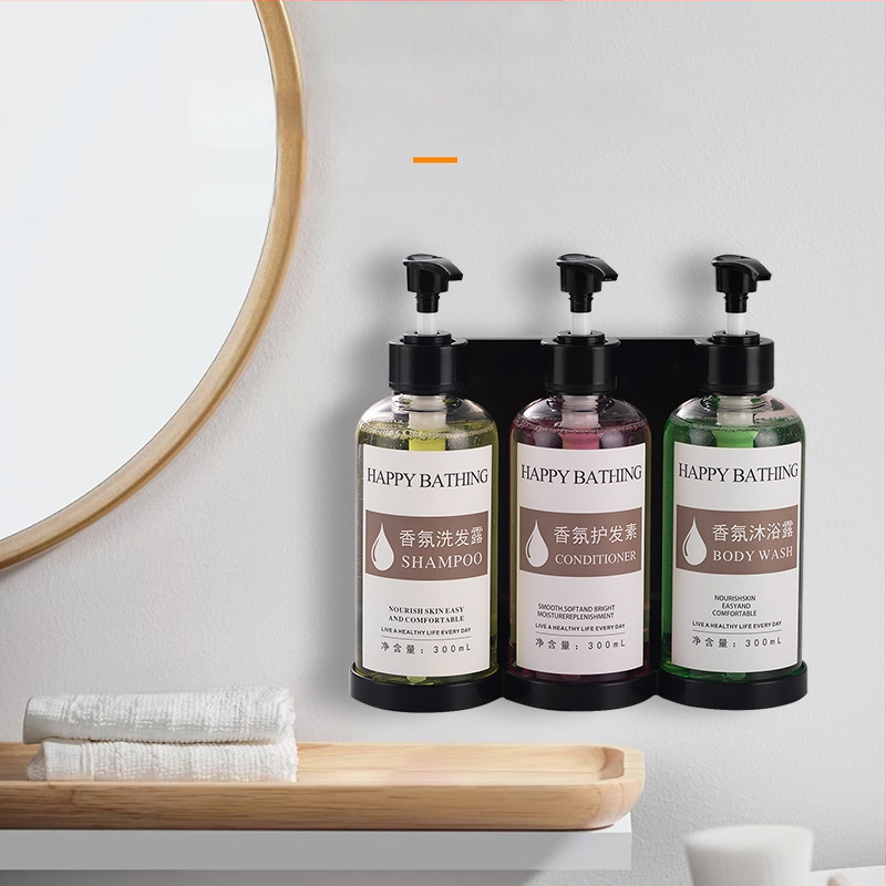 Τοίχο-μονταρισμένος διανομέας σαπουνιού χωρίς διάτρηση – χειροκίνητη πίεση, πλαστικό σώμα. Για μπάνιο ξενοδοχείου. Διανέμει σαπούνι, αντισηπτικό, σαμπουάν και gel μπάνιου.