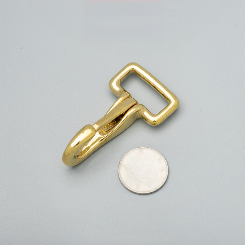 Mosadzový háčik na tašku s prackou - Tuoxin séria 56B, kožené doplnky