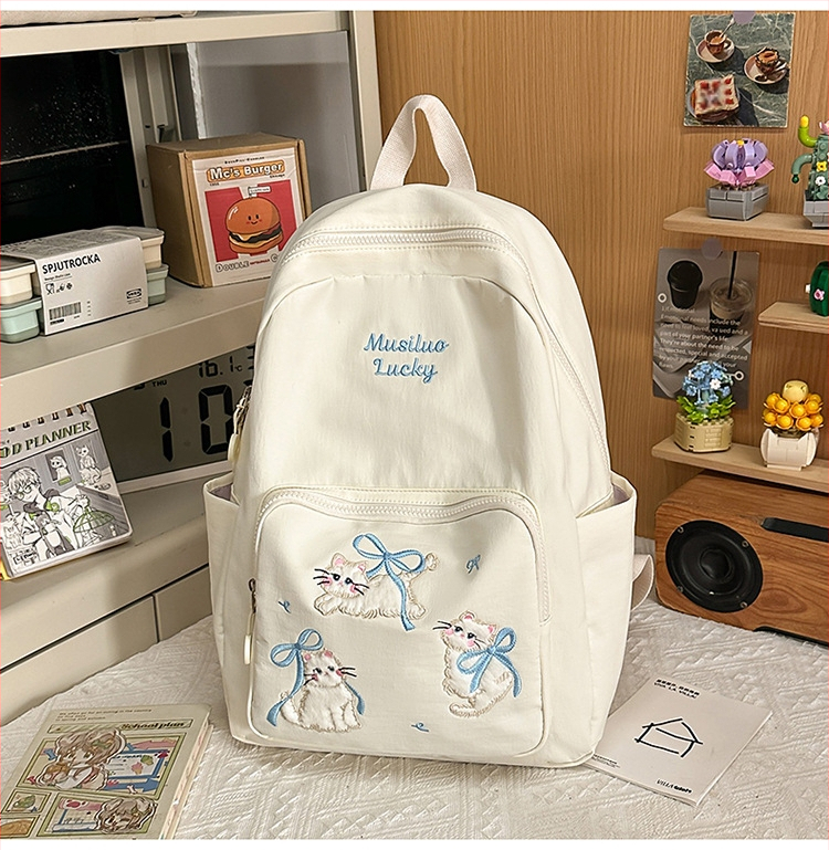 Rucsac din nylon cu motiv brodat de pisicuță, capacitate mare, extensibil cu protecție a coloanei și curele umerare curbate, pentru gimnaziu