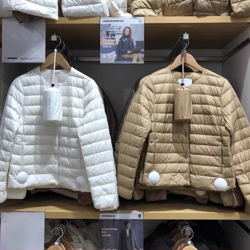 Dámska ľahká krátka bunda z bieleho kačacieho down, okrúhly výstrih, kasmírové výplň 51–55%