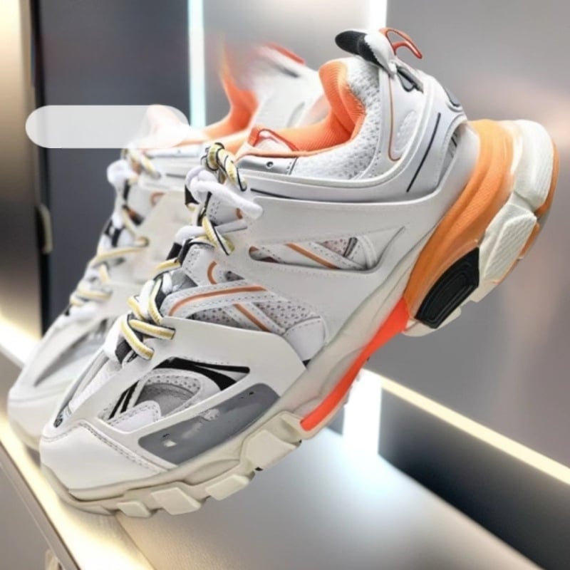 Unisex χαμηλά αθλητικά παπούτσια με επάνω συνθετικό δέρμα, στρογγυλή μύτη, κλείσιμο με κορδόνια, ύψος φτέρνας 3-5 εκ