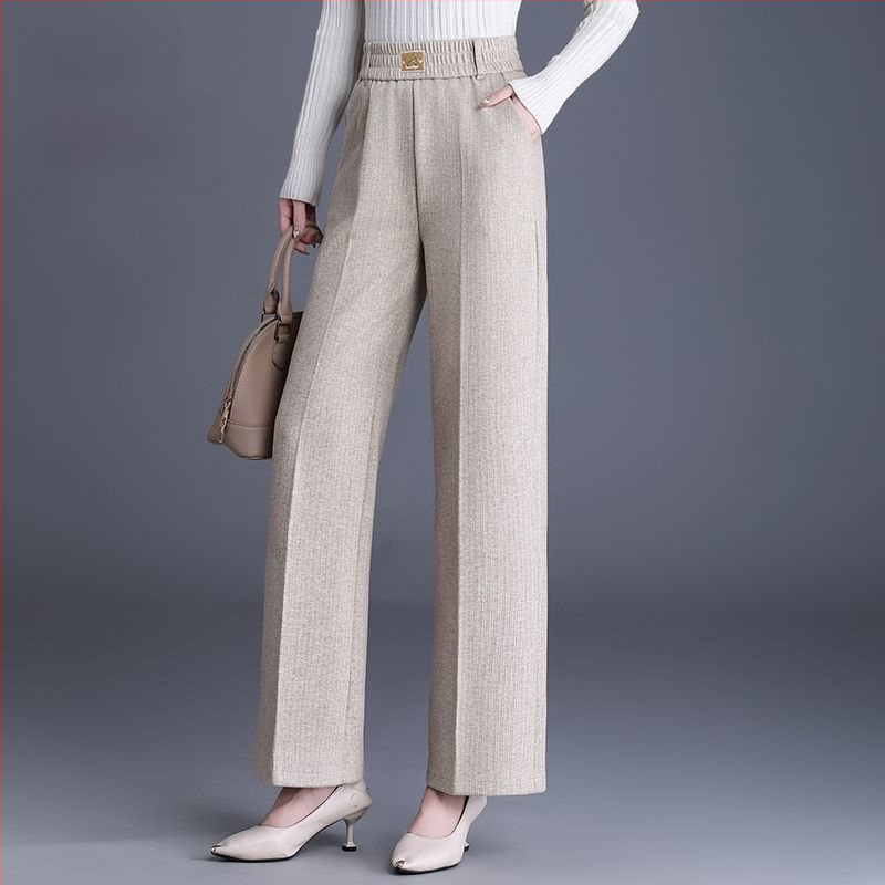 Pantaloni de damă drepți pentru toamnă-iarnă, talie înaltă, cu buzunare, țesătură țesută cu 70–80% lână, finisaj mercerizat.