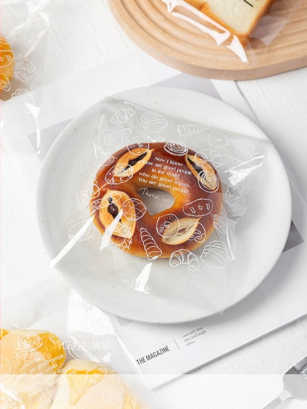 Átlátszó zipzáras kenyérzsákok bagelhez, pirítósokhoz és fánkokhoz; önzáró csomagoló tasakok piknikhez.