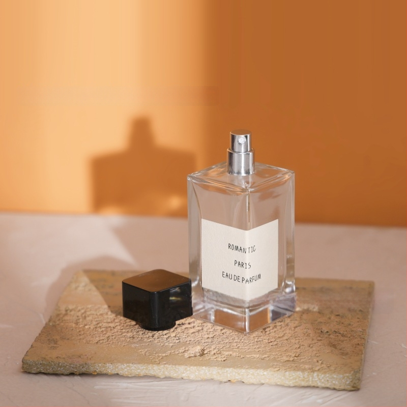 Sticluță de parfum din sticlă pătrată 50 ml/100 ml cu pulverizator, dop bayonet, pentru ambalarea parfumurilor și uleiurilor esențiale