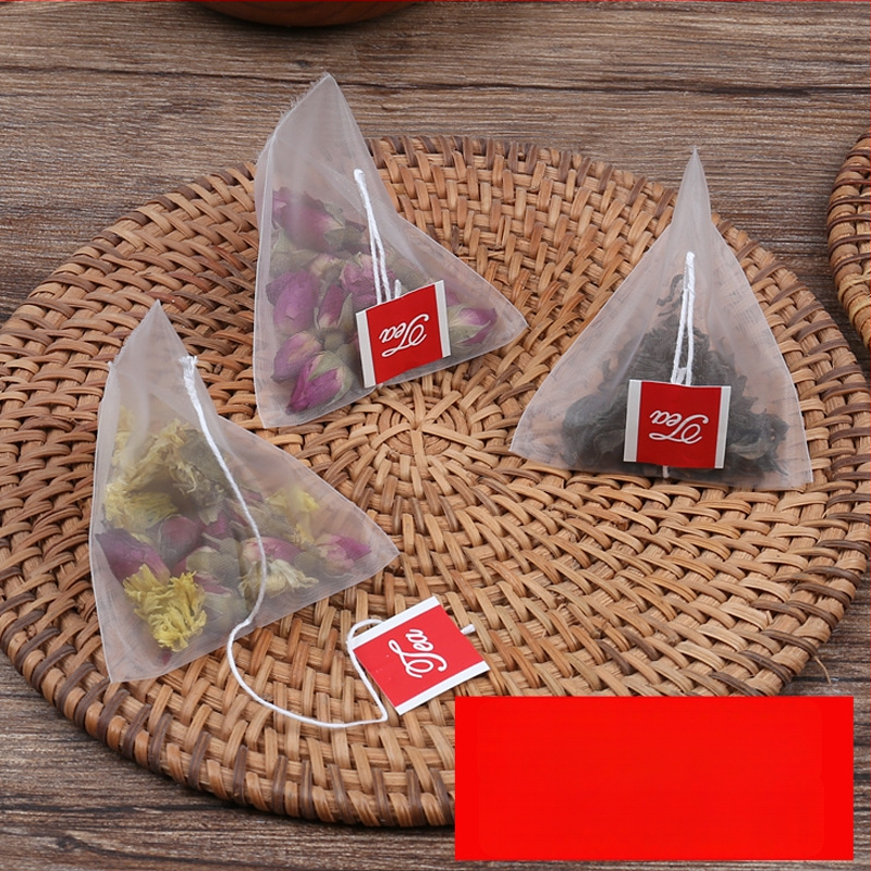 Pungi de ceai triunghiulare din nylon, de calitate alimentară, cu plasă filtrantă și sigilare termică.