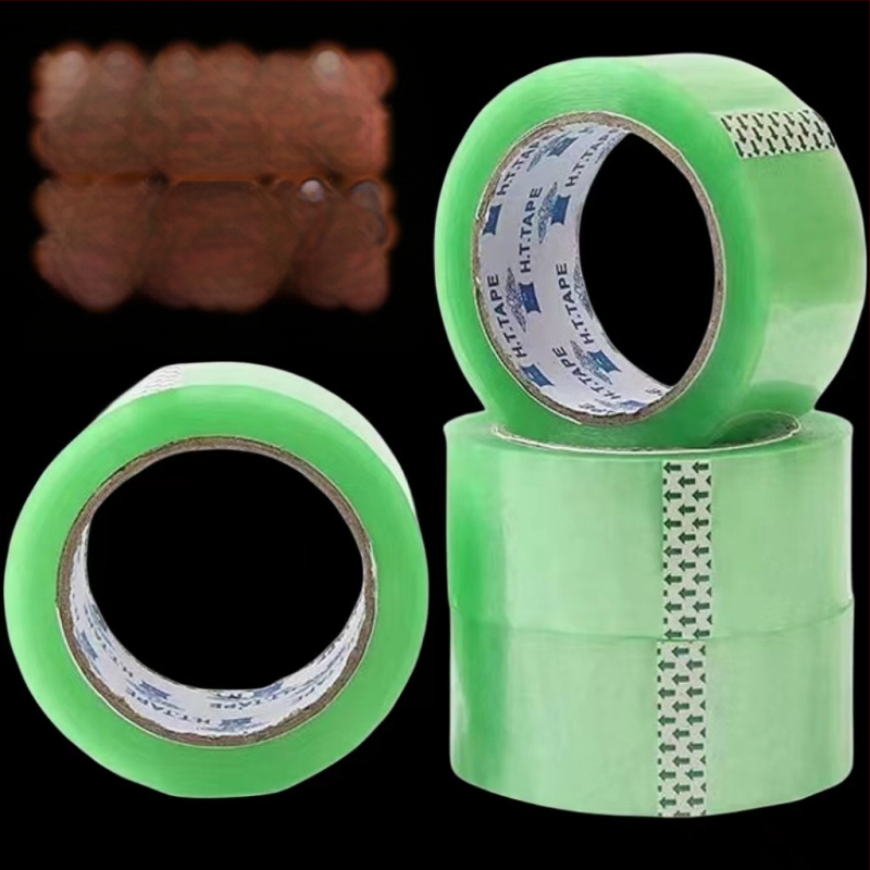 Bandă de ambalare transparentă verde, rolă mare, lățime 5,5 cm, pentru sigilare și ambalare.
