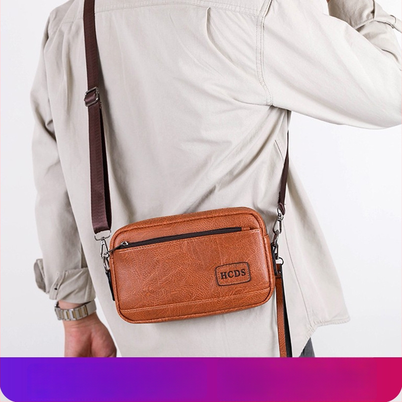 Geantă de umăr pentru bărbați, capacitate mare, casual, impermeabilă și rezistentă la uzură, crossbody cu logo, stil business casual.