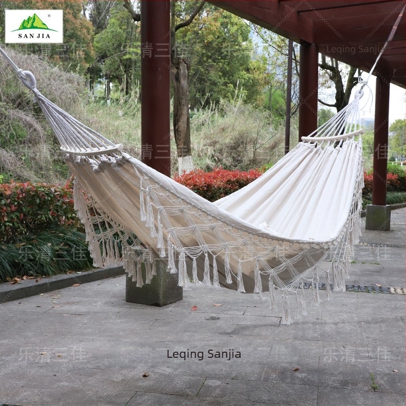 Ευρωπαϊκή και αμερικανική αιώρα με φούντα για εξωτερικούς χώρους, πτυσσόμενη χειροποίητη κούνια από καμβά, κάμπινγκ με καμπύλη λαβή, φορητή διπλή κρεμαστή καρέκλα χονδρικής