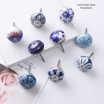 Yunchang στρογγυλή κεραμική λαβή για ντουλάπες και συρτάρια — μοντέρνος μινιμαλιστικός στυλ, ελαφρύς πολυτελής χαρακτήρας; υλικό κεραμικό; επίστρωση ηλεκτροπλατίωσης; μάρκα Yunchang Hardware.